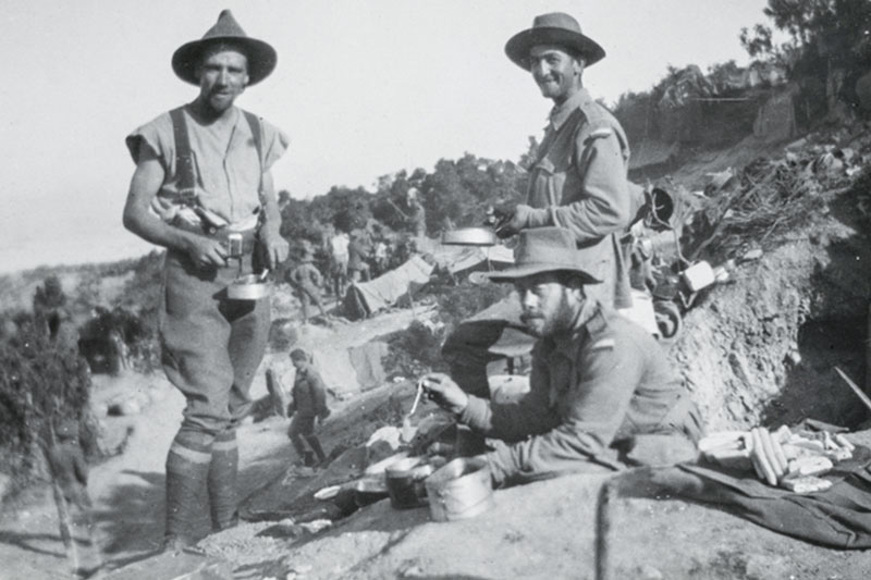 Australian War Memorial - Soldiers of the 4th Battalion AIF at the top of Shrapnel Gully, Gallipoli having breakfast.