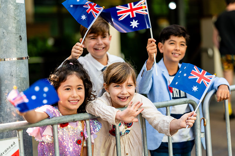 ANZAC Day parade flag wavers